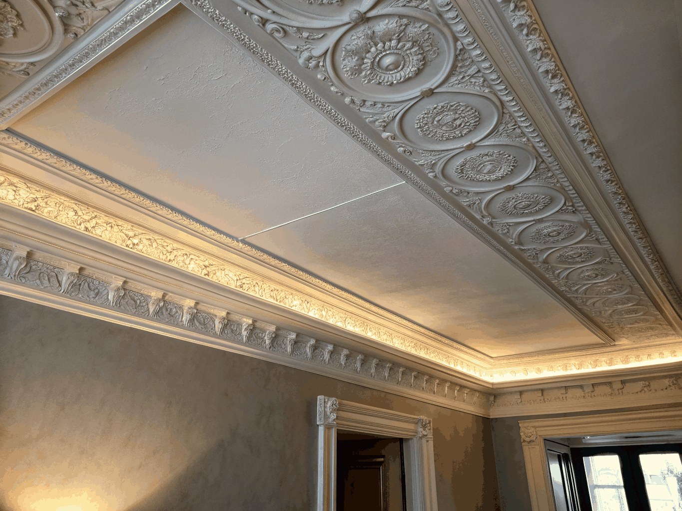 Expertly installed ceiling crown molding and architectural details